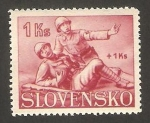 Stamps Slovakia -  socorriendo herido de guerra