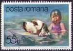 Stamps : Europe : Romania :  Niña con perro