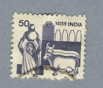 Stamps India -  Mujer y bueyes