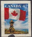 Stamps : America : Canada :  CANADA 1999 Scott 1707 Sello Bandera y Inukshuk usado pequeño corte parte inferior