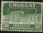 Stamps : America : Uruguay :  Impuesto encomiendas. Edificio de la Imprenta Nacional.
