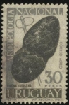 Stamps America - Uruguay -  Arqueología nacional. Hacha indígena de piedra.