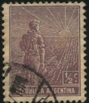 Stamps Argentina -  Labrador surcando la tierra con arado de mano. Sol naciente.