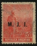 Stamps : America : Argentina :  Sol naciente, labrador surcando la tierra con arado de mano. Sobreimpreso M. J. I.  Ministerio de Ju