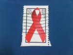 Sellos de America - Estados Unidos -  Aids-Campaña contra el Sida-Sensibilidad sobre ayudas-Lazo Rojo (Awareness)