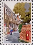 Sellos de Europa - Reino Unido -  350 Years of Royal Mail Public Postal Service 34p Stamp (1985) Town Letter Delivery