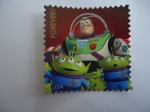 Stamps America - United States -  Buzz Lightyear y Dos extrangeros. Dibujos Animados.