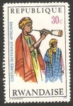 Stamps : Africa : Rwanda :  347 - joven tocando flauta de madera en Niger