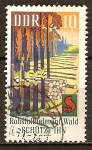 Stamps Germany -  Protección forestal.- La tala de los bosques y la resina DDR.