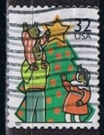 Sellos de America - Estados Unidos -  Scott  3109 Navidad Decorando el Arbol (2)