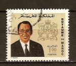 Stamps : Africa : Morocco :  El Rey Hassan y escudo de Armas.