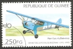 Sellos del Mundo : Africa : Guinea : Avión Piper Cub J-3 de Estados Unidos