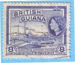 Stamps : America : Guyana :  Sugar cane enterin factory