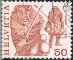 Stamps : Europe : Switzerland :  SERIE BÁSICA 1977. COSTUMBRES POPULARES. EL ACHETRINGELE, DE LAUPEN. Y&T Nº 1038
