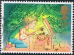 Stamps United Kingdom -  NAVIDAD'87. DECORANDO EL ÁRBOL. M 1126
