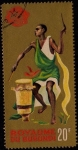 Sellos del Mundo : Africa : Burundi : Nativo tocando el tambor. Fondo dorado.