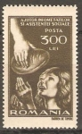 Stamps Romania -  NIÑO  RECIBIENDO  ALIMENTO