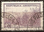 Sellos de America - Argentina -   La caña de azúcar y la fábrica.