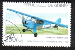 Sellos de Africa - Guinea -  Piper Cub J-3