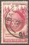 Stamps Australia -  50th  ANIVERSARIO  DEL  CLUB  ROTARIO  INTERNACIONAL.  GLOBO,  BANDERAS  Y  EMBLEMA.