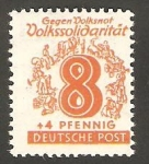 Stamps Germany -  23 - Cifra y siluetas de trabajadores