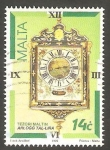 Stamps Malta -  944 - Tesoro de Malta, reloj Tal-lira