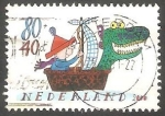 Sellos de Europa - Holanda -  1804 - Niño en un barco, con cabeza de animal en la proa
