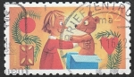 Stamps Germany -  2994 - Niño con un muñeco 