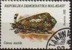 Sellos de Africa - Madagascar -  MADAGASCAR 1992 Michel 1419 Sello Moluscos Conus Textile MALAGASY 18A