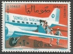 Stamps : Africa : Somalia :  Passengers leaving DC-3.