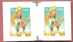 Stamps : Europe : Ireland :  Navidad - angel niño con arpa - Nollaig 1999