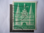 Stamps Germany -  La Puerta de Holstentor, en la ciudad de Lübeck.