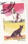 Stamps Oman -  perro y gato de raza- spaniel y burmese
