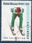 Sellos de Africa - Guinea Bissau -  Calgary 1988 salto en sky