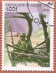 Stamps : America : Guinea :  90 aniv de la Organización Scout Internacional