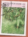 Sellos de Africa - Guinea -  90 aniv de la Organización Scout Internacional