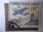 Stamps : America : Chile :  Avión y Estatua Monolítica (Moai) en la Isla de Pascua.