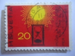 Stamps Switzerland -  reloj de Arena, bajo el Sol estilizado.