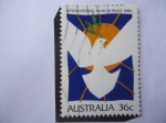 Stamps Australia -  International Year of Peace 1986 - Año Internacional de la Paz - Paloma y Ramo de Olivo-Sol.