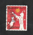Stamps Netherlands -  3358 - Un jóven jugando con un perro en la nieve
