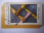 Stamps Germany -  Alemania,República Federal- Manos de Diferentes Razas- Cooperación de Países en Desarrollo.