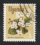 Sellos de Africa - Uganda -  82 - Flor cordia abyssinica