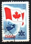 Stamps Canada -  BANDERA  DE  CANADÁ  SOBRE  GLOBO  Y  EMBLEMA  DEL  CENTENARIO