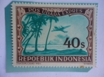 Stamps Indonesia -  región de Lagos - Avión volando sobre el lago. 
