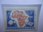Stamps : Africa : Rwanda :  Ruanda-Urundi (Áfr.Oriental)-10°Aniv.de la Comisión de Coop. Técnica en África y Sahara - Dutch text