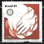 Sellos de America - Brasil -  Rotary - manos con emblema