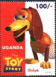 Sellos de Africa - Uganda -  HISTORIA  DE  JUGUETES.  SLINKY.