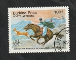 Stamps : Africa : Burkina_Faso :  298 - A caballo cazando una gacela con bolas