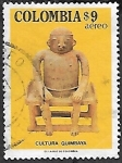 Stamps : America : Colombia :  Cultura quimbaya :Hombre sentado sobre taburete