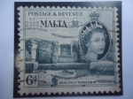 Stamps : Europe : Malta :  Neolithic Temples at Tarxien-Templo Neolítico en Tarxien  Postage Revenue-Serie:Elizabeth II (1956/5